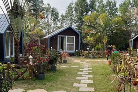 Bollineni Homes — landscaping by Tropical Gardening, view 1